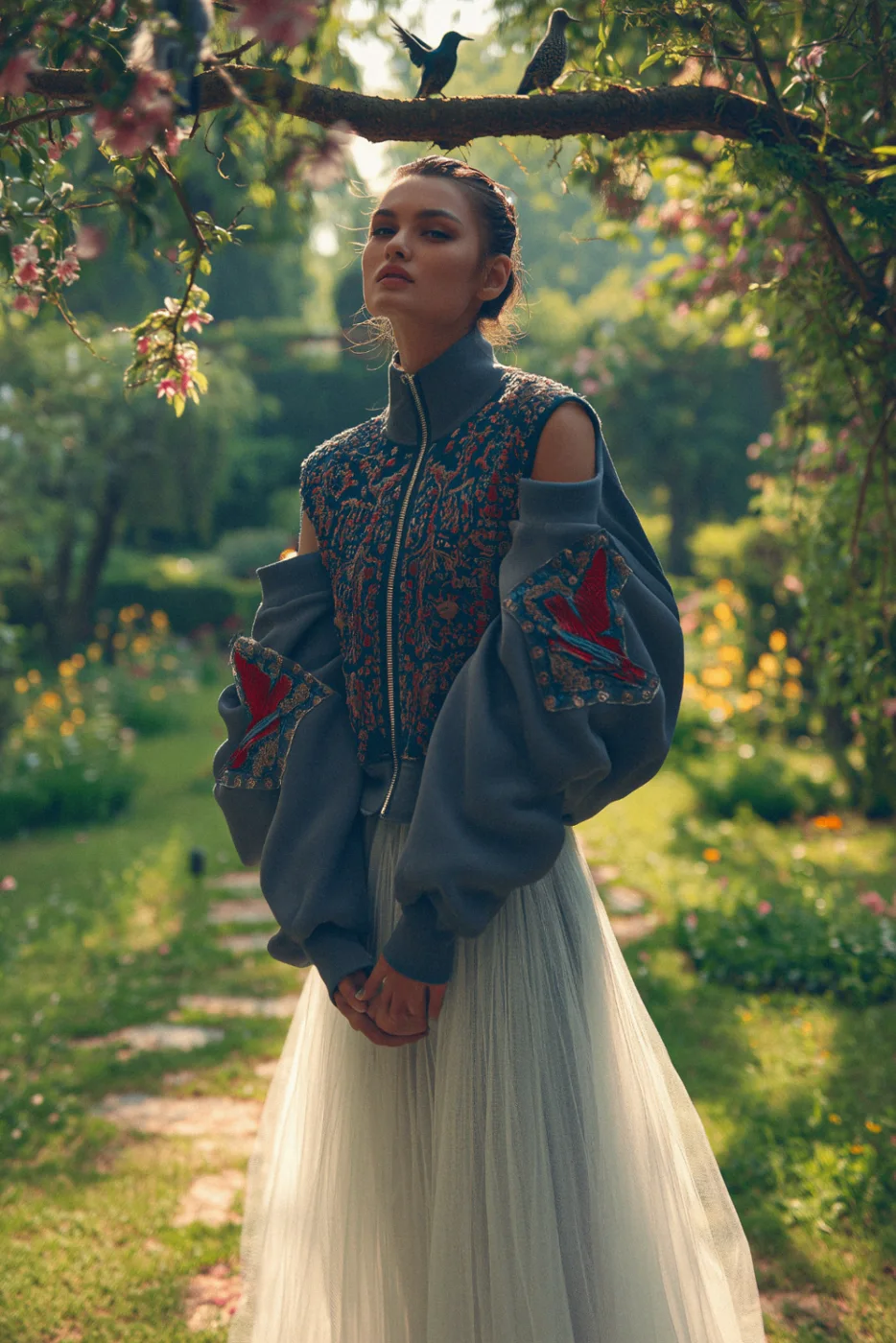 AI Atelier, an embroidered bomber jacket in a garden